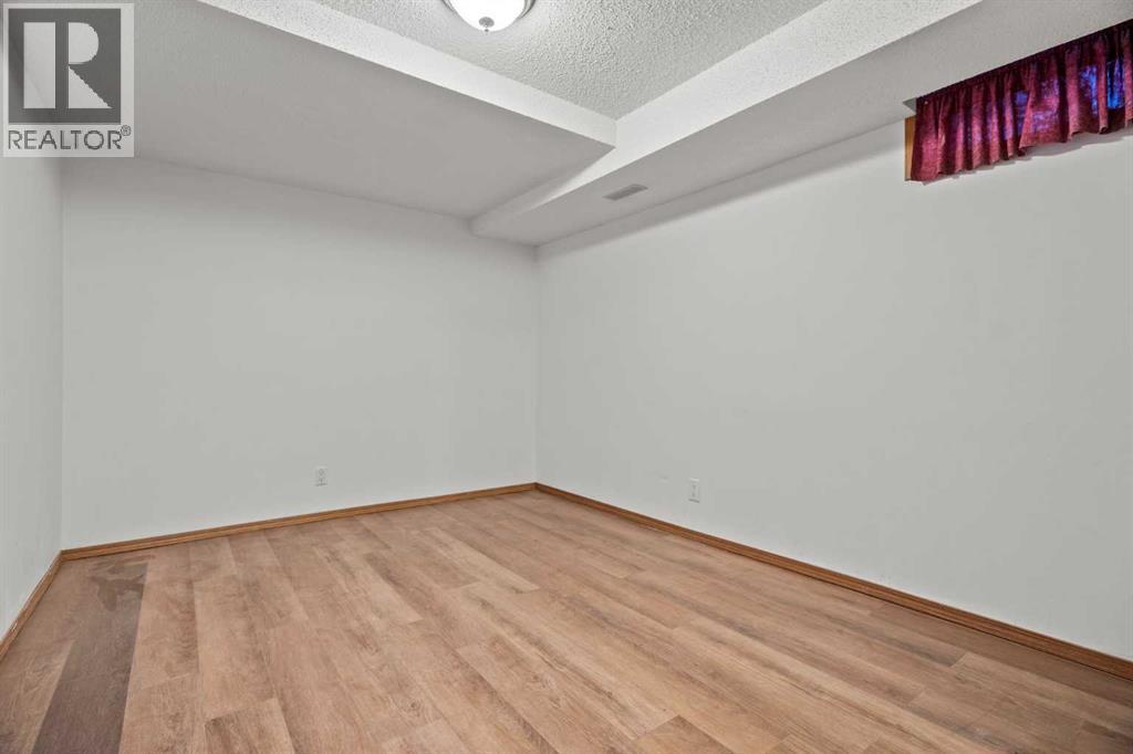 6938 Laguna Way Ne, Calgary, Alberta  T1Y 6W2 - Photo 25 - A2271088