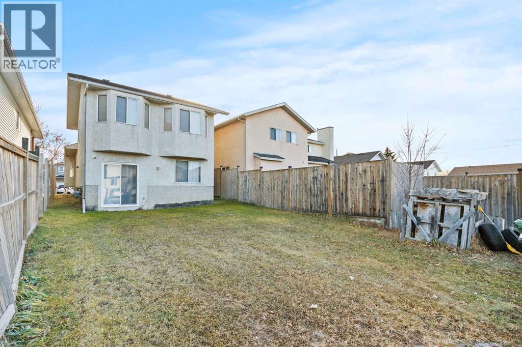 6938 Laguna Way Ne, Calgary, Alberta  T1Y 6W2 - Photo 29 - A2271088