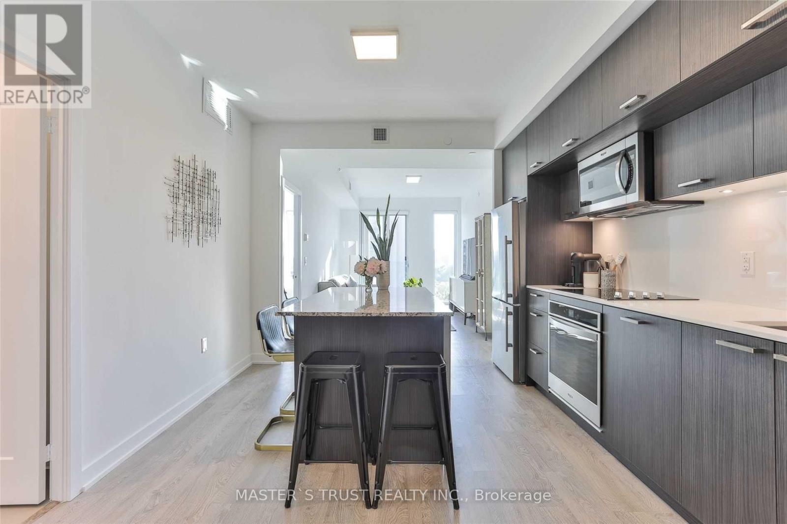 1002 - 50 Mccaul Street, Toronto, Ontario  M5T 1V9 - Photo 3 - C12745772