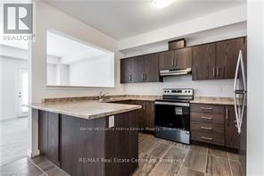 8 Elsegood Drive, Guelph (Kortright East), Ontario  N1L 0R5 - Photo 4 - X12746108