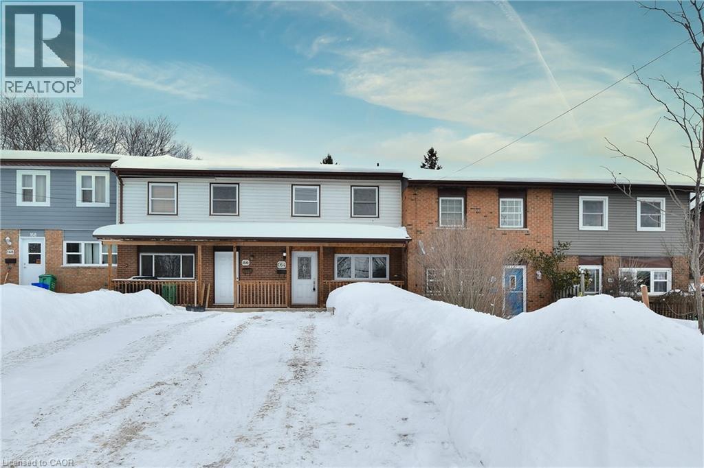 Exceptionally well maintained 3-bedroom freehold townhouse, no condo fees, perfect for first-time buyers looking to enter the market. This bright and spacious home features a large eat-in kitchen with ample cupboards and counter space, updated in 2022 along with new LVP on main-floor, refurbished hardwood on the second level, and new fridge and dishwasher. Hardwood floors run throughout the main and upper levels, and the living room offers a walk-out to a deck and privacy-fenced yard. The lower level includes a mostly finished rec room and utility room. Recent 2025 updates include new rear yard window and door trim and new eaves troughs. Many additional extras-don't miss this opportunity. (id:48254)