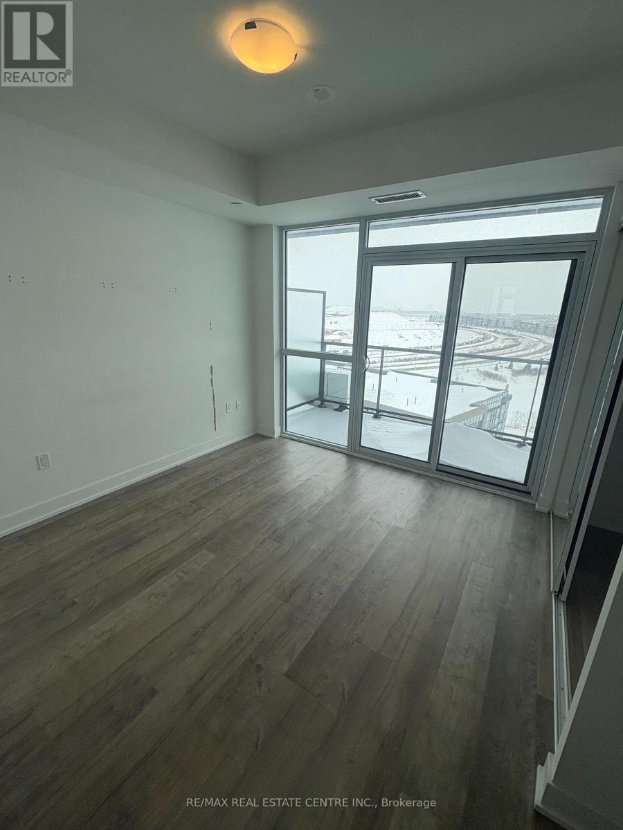 50 George Butchart Drive, Toronto, Ontario  M3K 0C9 - Photo 5 - W12746676