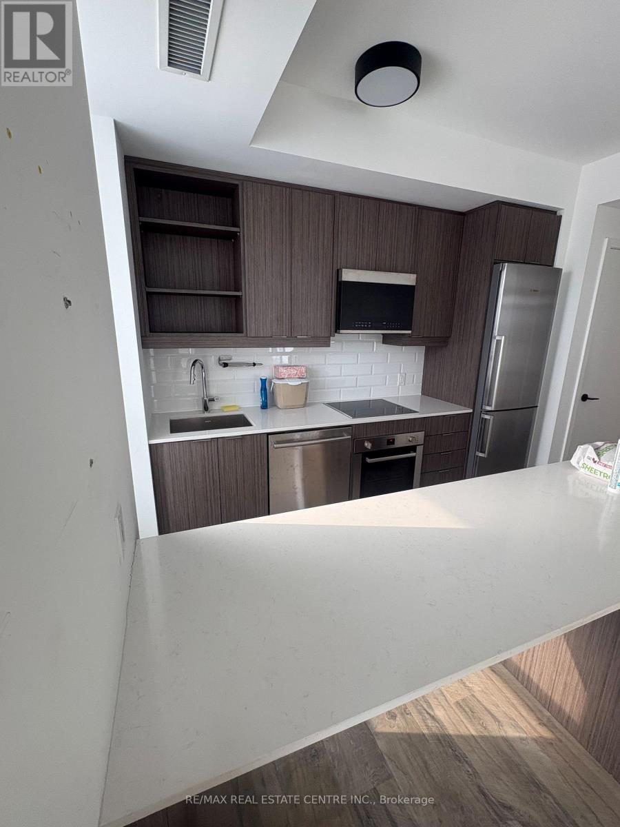 50 George Butchart Drive, Toronto, Ontario  M3K 0C9 - Photo 8 - W12746676