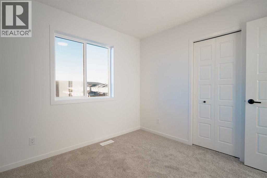 143 Wolf Hollow Rise Se, Calgary, Alberta  T2X 4M8 - Photo 22 - A2269119