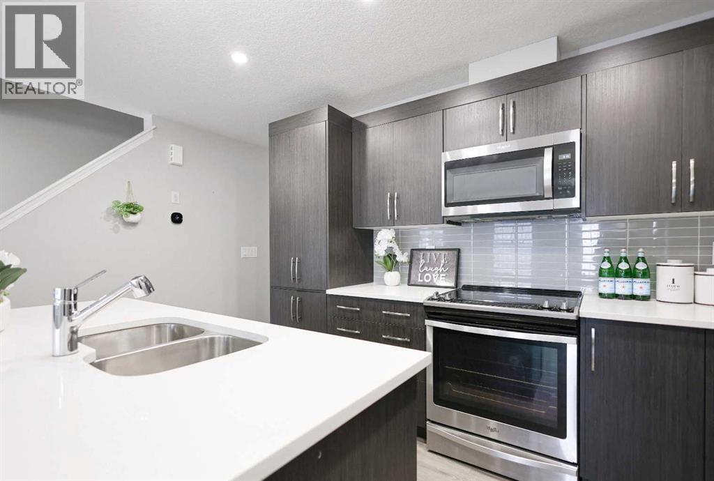 231 Windford Crescent Sw, Airdrie, Alberta  T4B 5E5 - Photo 5 - A2283120