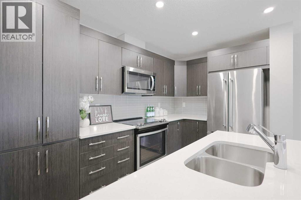 231 Windford Crescent Sw, Airdrie, Alberta  T4B 5E5 - Photo 4 - A2283120