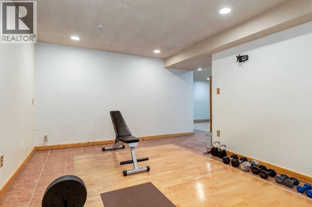 7103 Hunterwood Road Nw, Calgary, Alberta  T2K 4J5 - Photo 30 - A2275637