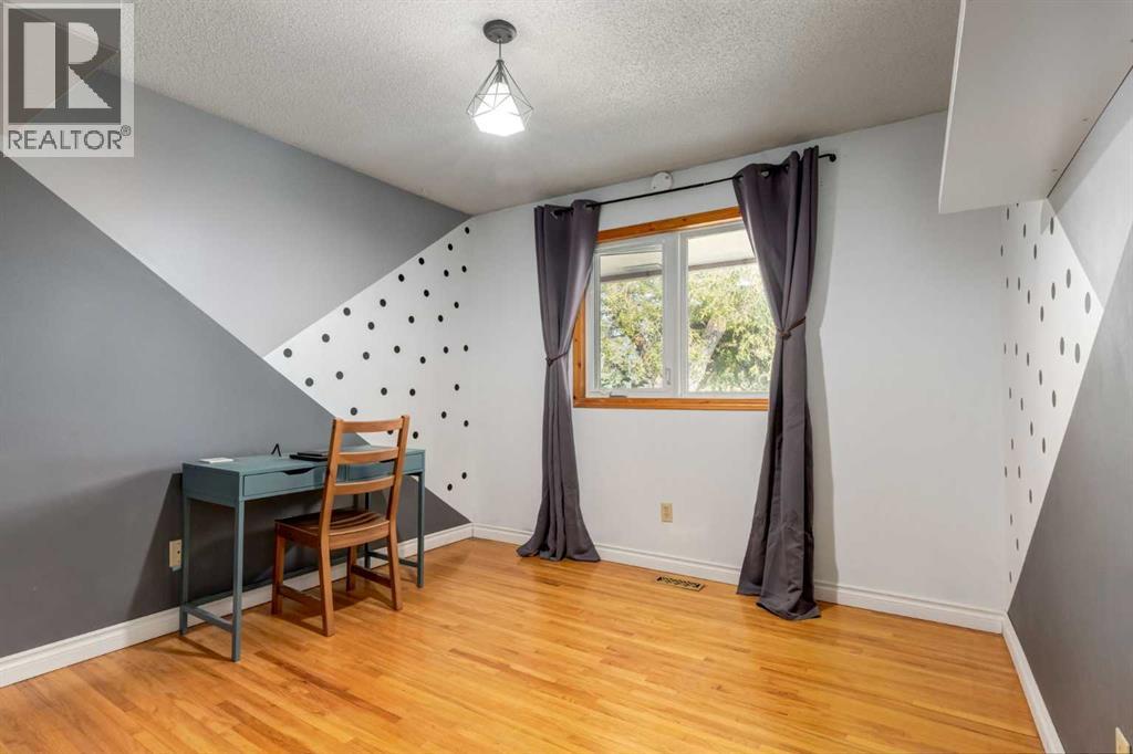 7103 Hunterwood Road Nw, Calgary, Alberta  T2K 4J5 - Photo 18 - A2275637