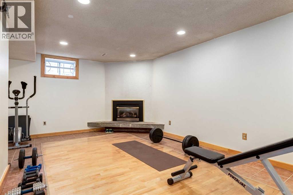 7103 Hunterwood Road Nw, Calgary, Alberta  T2K 4J5 - Photo 28 - A2275637