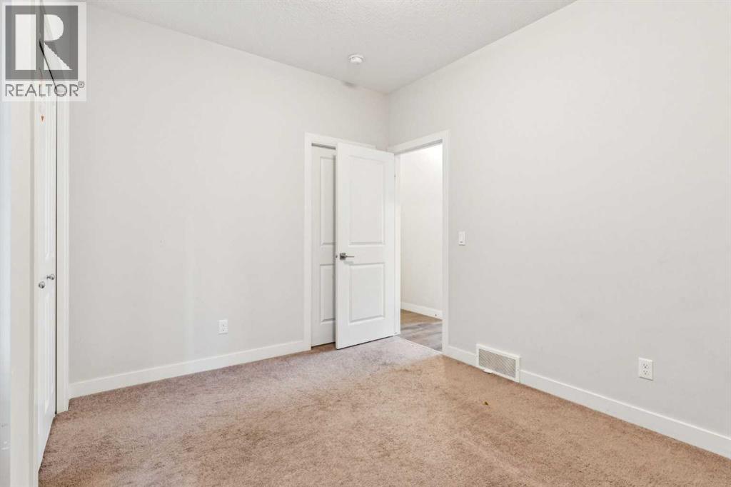 118 Saddlestone Park Ne, Calgary, Alberta  T3J 0Z4 - Photo 8 - A2264197