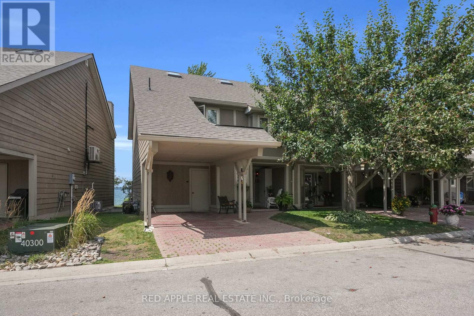 Welcome to 12 Davy Point Circle! Discover this Stunning, 3 Story, Direct Waterfront Townhome Corner Unit, Offering Breathtaking Lake Views from Multiple Vantage Points. Nestled in a Private Enclave of 26 Townhomes, this Property is the Perfect Year-Round Residence or Cottage Getaway, Conveniently Located Less than an Hour from T.O. on Lake Simcoe (Cooks Bay). This Incredible Waterfront Home Features a Bright Open Concept Main Floor Layout & Includes a Functional Kitchen, Separate Laundry Area & Powder Room. The Gas Fireplace, Floor-to-Ceiling Windows, Living & Dining Area Steps Out to the Spectacular Lake View Deck. The Primary Suite is a Retreat with Double Closets & Spacious 4 pc En-suite. Included are 2 Additional Bedrooms with Ample Storage. The Private & Spacious Loft Serves as an Ideal Office Space, a Potential 4th Bedroom or an In-Law Suite with Ample Storage Area. The Lakeside Location Offers Year-Round Recreation. Living at Davy Point Adult Community, You Can Enjoy the Communal Day Dock with Watercraft Storage and an Inground Heated Pool. This Exceptional Property is Close to Many Amenities & Recreational Opportunities Such as the MURC, the ROC & Orchard Beach Golf Course. The Future Proposed Bypass is Aimed at Easing Traffic Congestion to Toronto. (id:48254)