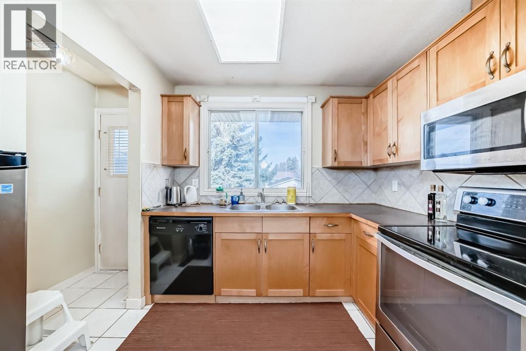 247 Bracewood Road Sw, Calgary, Alberta  T2W 3C2 - Photo 7 - A2270469