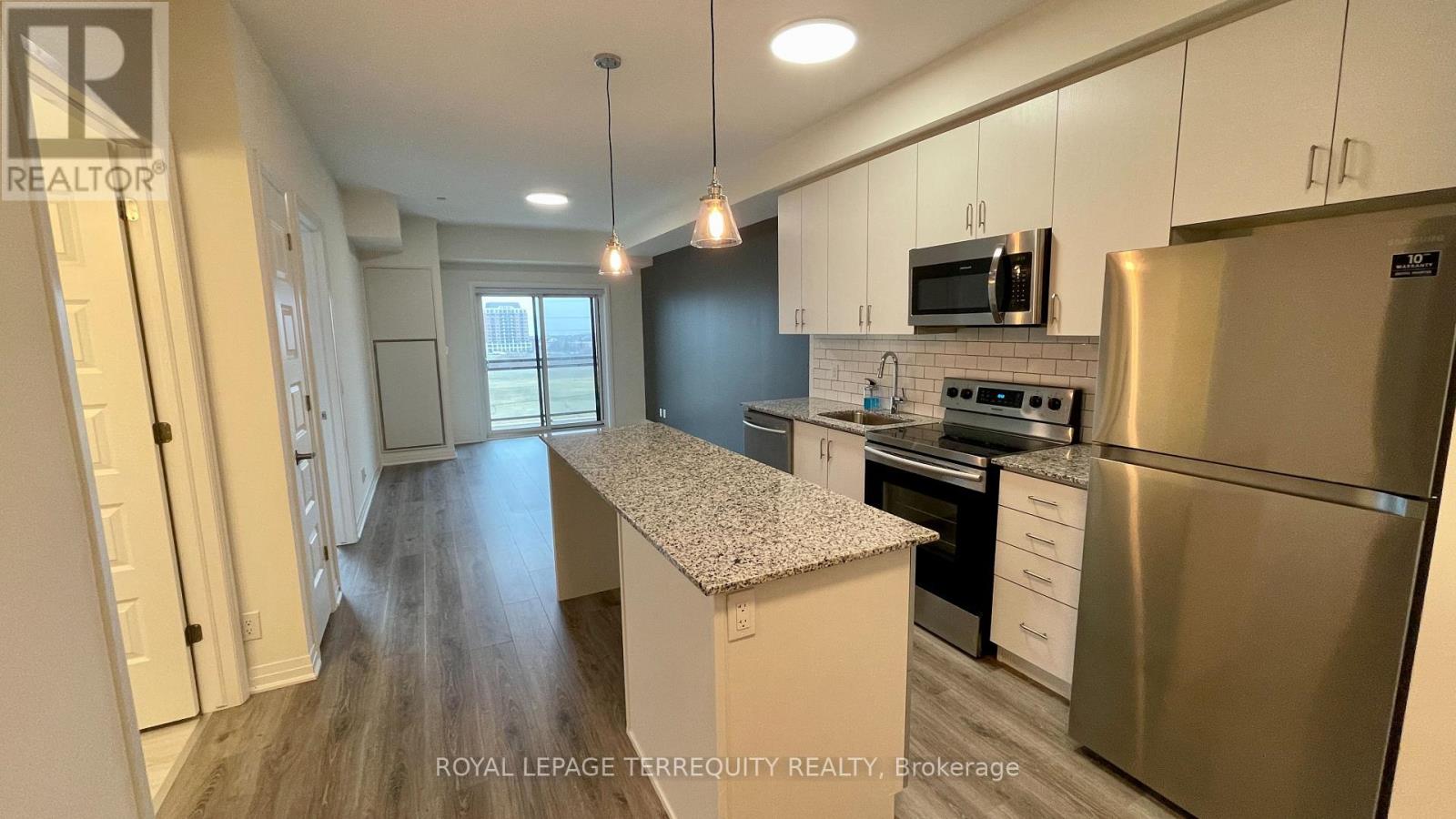 414 - 128 Grovewood Common, Oakville, Ontario  L6H 0X3 - Photo 4 - W12748178