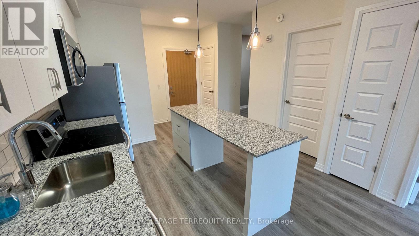 414 - 128 Grovewood Common, Oakville, Ontario  L6H 0X3 - Photo 8 - W12748178