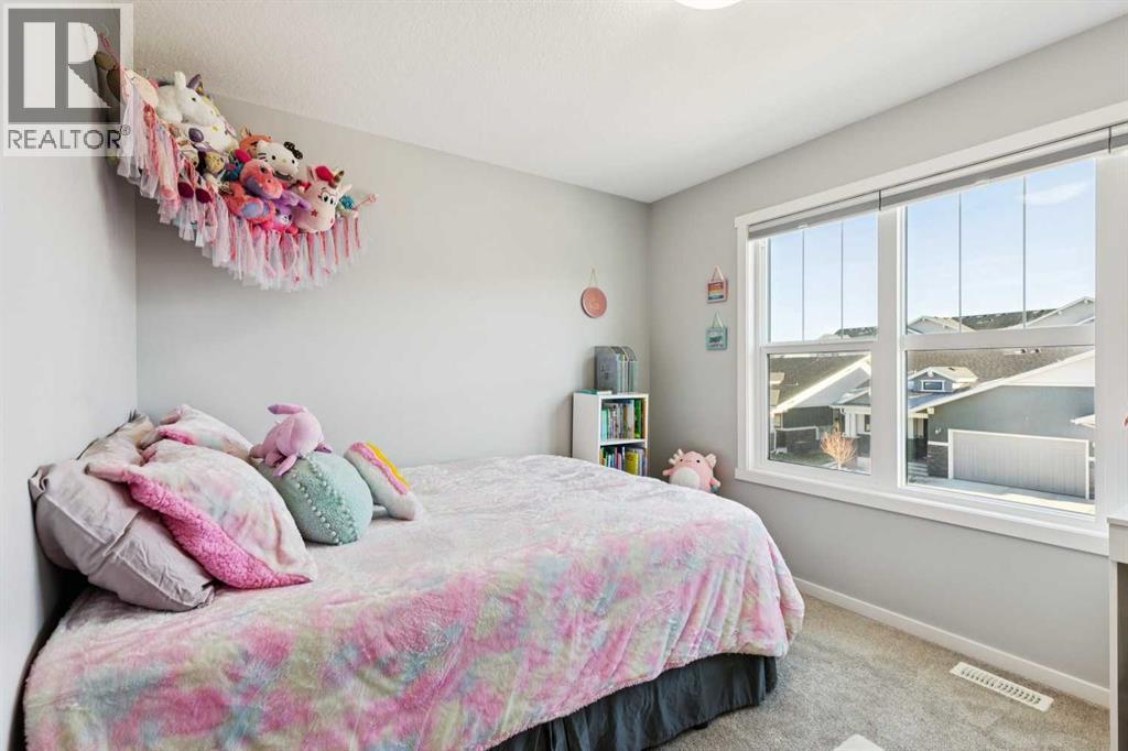 57 Crestridge Bay Sw, Calgary, Alberta  T3B 6H2 - Photo 30 - A2272047