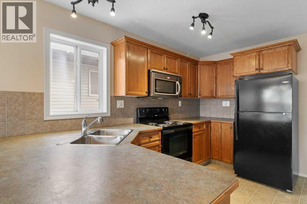 97 Inglewood Drive, Red Deer, Alberta  T4R 0B2 - Photo 7 - A2280599