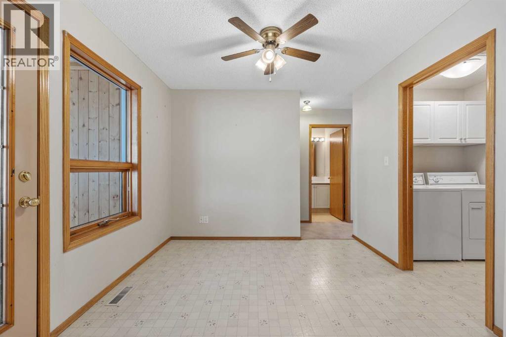 220 Sunset Place, Okotoks, Alberta  T1S 1P3 - Photo 13 - A2268466