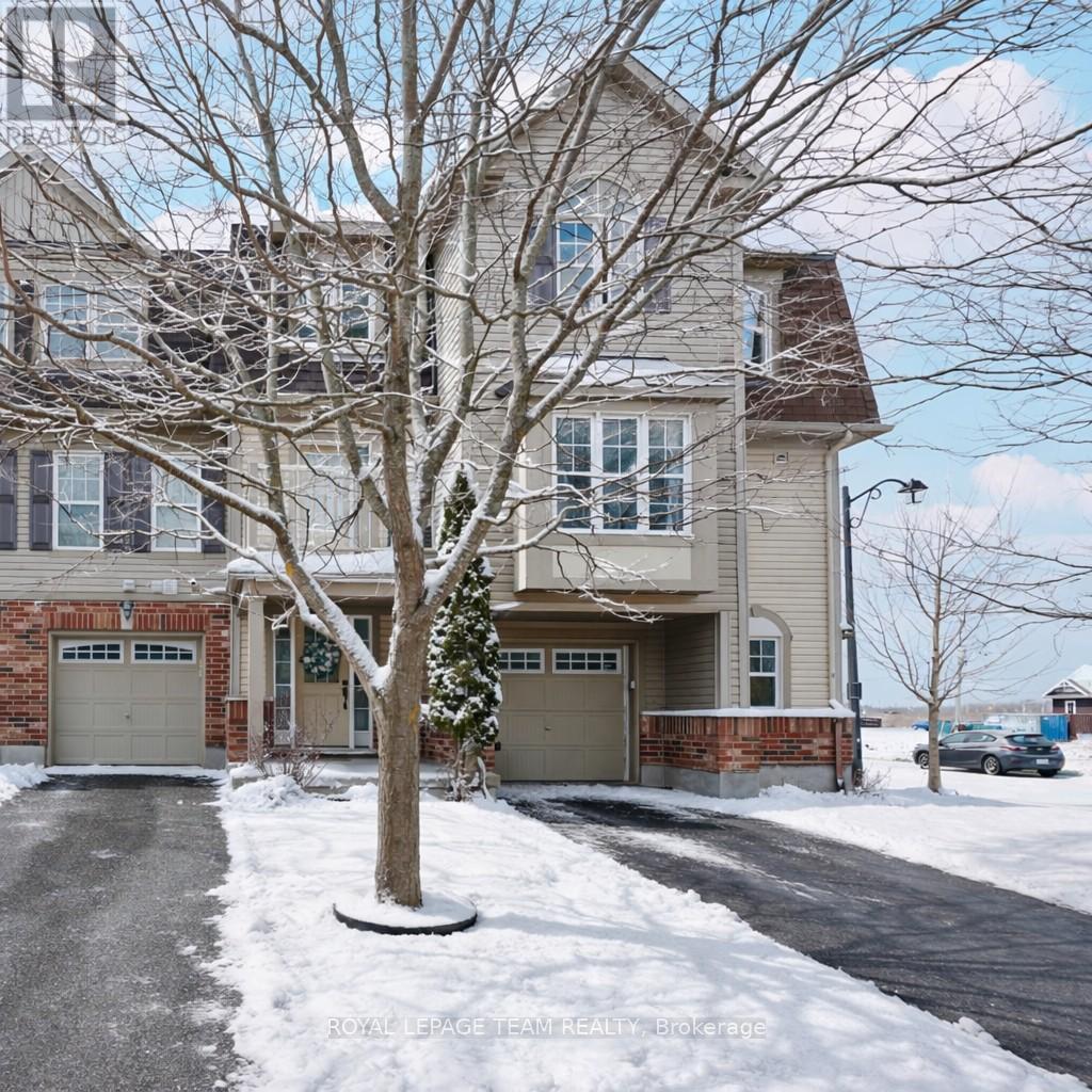 Welcome to this lovely 2 bedroom home in Stittsville, the perfect blend of city living and quiet surroundings. This home is well designed with comfort and convenience in mind. On the main level you will find the large laundry room and access to the garage. The second floor welcomes you to the main living space with a galley kitchen, balcony and a connected open breakfast bar, along with the combined living room, dining room and powder bathroom. This area is great for entertaining. Enjoy the tranquility of nearby greenspace, all while being minutes away from shopping, dining, and entertainment. (id:48254)