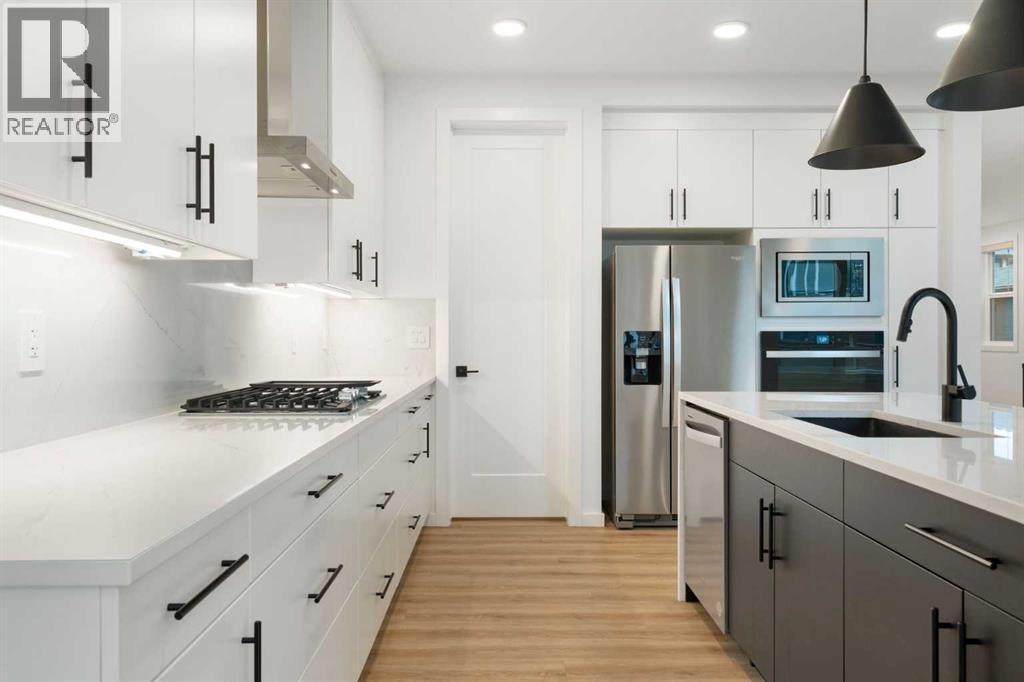 296 Spring Creek Circle Sw, Calgary, Alberta  T3H 6G4 - Photo 7 - A2275696