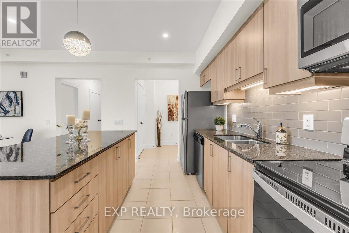 409 - 8 Culinary Lane, Barrie, Ontario  L9J 0T2 - Photo 4 - S12749840