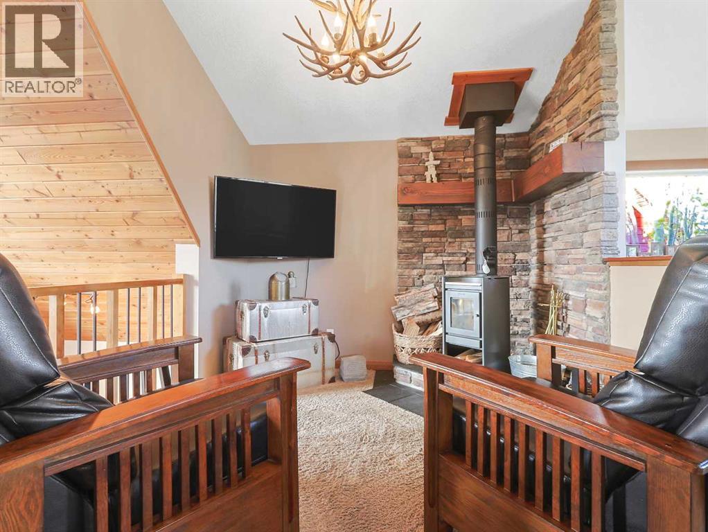 256 Cottageclub Crescent, Rural Rocky View County, Alberta  T4C 1B1 - Photo 18 - A2265981