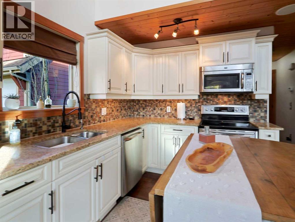 256 Cottageclub Crescent, Rural Rocky View County, Alberta  T4C 1B1 - Photo 10 - A2265981