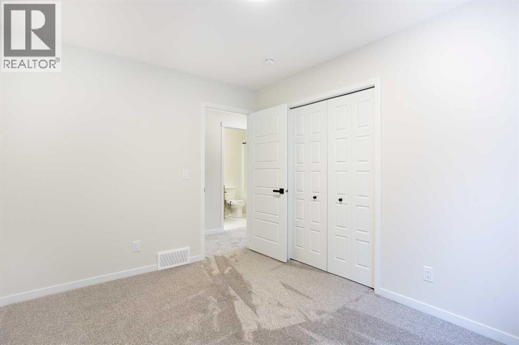 53 Creekside Passage Sw, Calgary, Alberta  T2X 5V6 - Photo 24 - A2279223