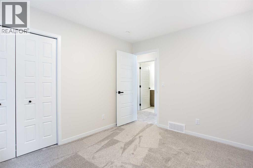 53 Creekside Passage Sw, Calgary, Alberta  T2X 5V6 - Photo 21 - A2279223