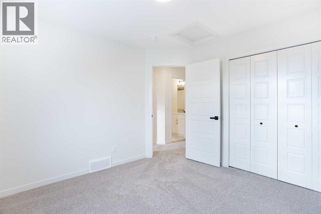 65 Creekside Passage Sw, Calgary, Alberta  T2X 5V6 - Photo 27 - A2279253