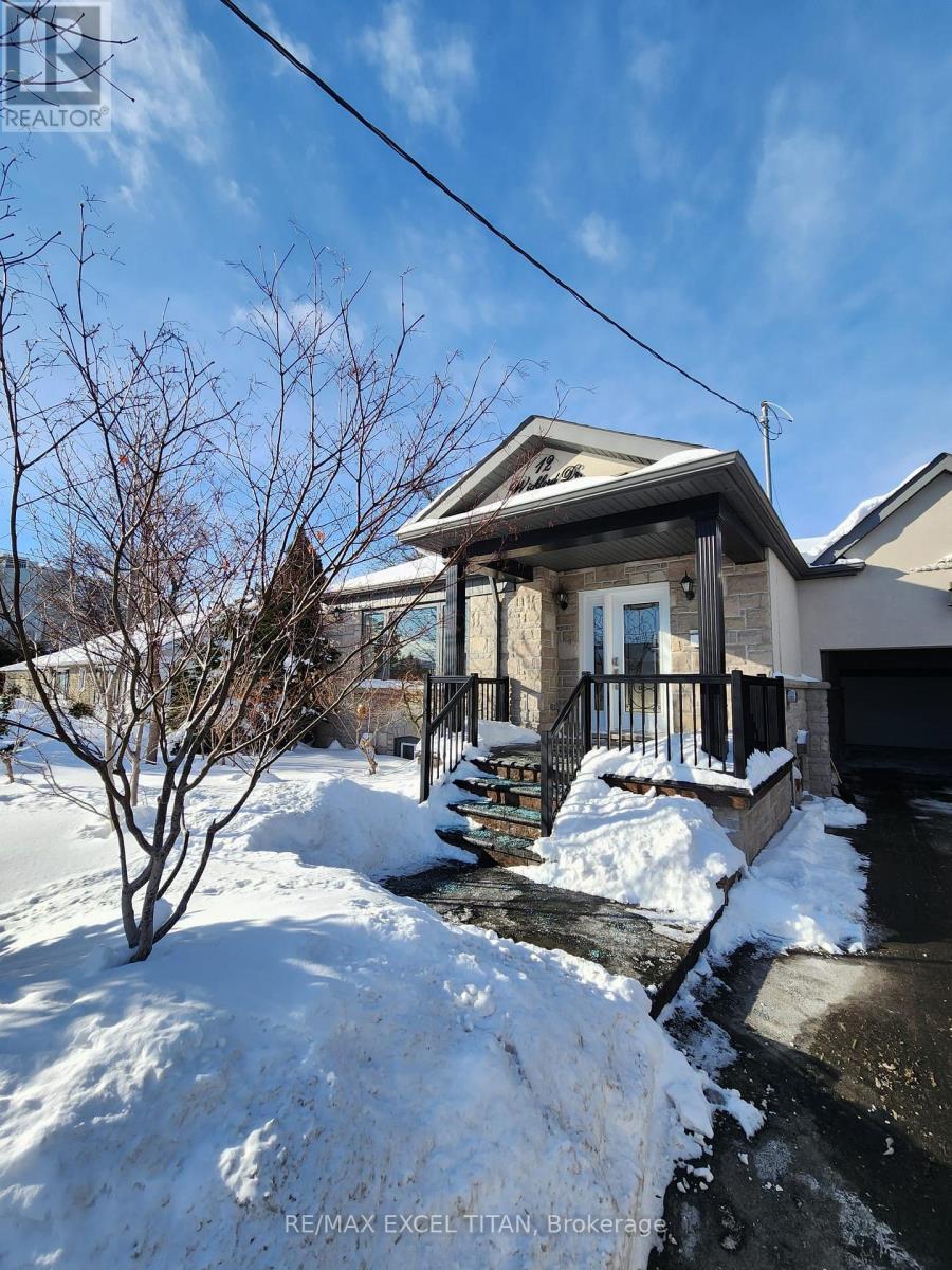 12 Wickford Drive, Toronto, Ontario  M6L 1K7 - Photo 2 - W12750624
