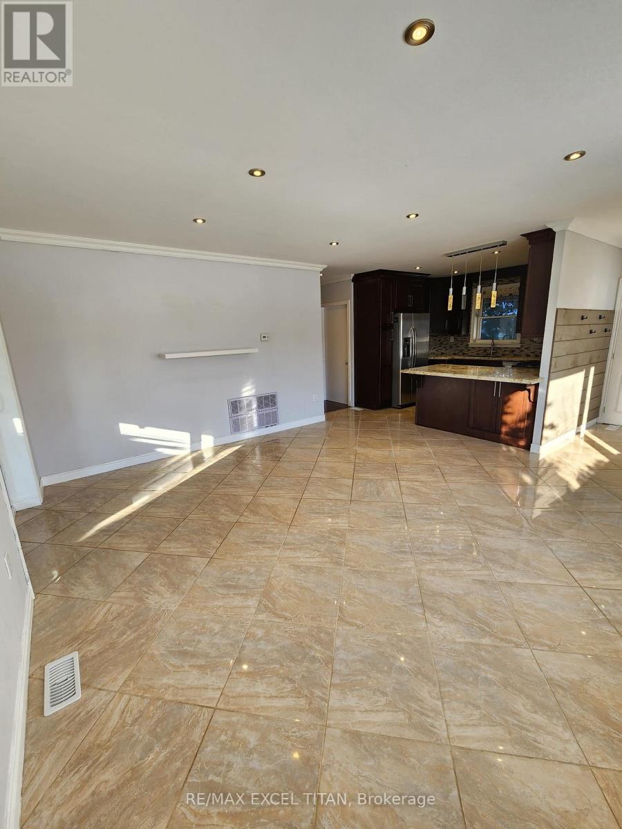 12 Wickford Drive, Toronto, Ontario  M6L 1K7 - Photo 5 - W12750624