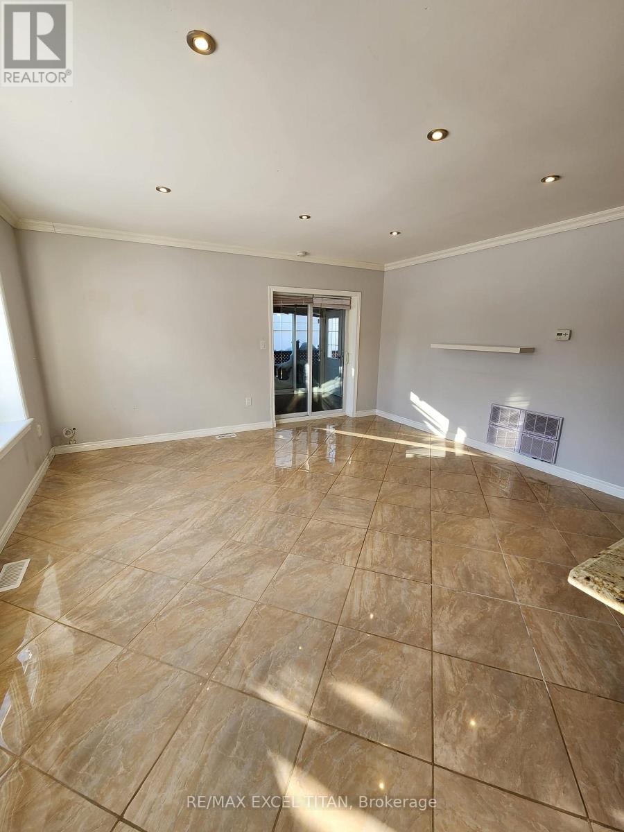 12 Wickford Drive, Toronto, Ontario  M6L 1K7 - Photo 6 - W12750624