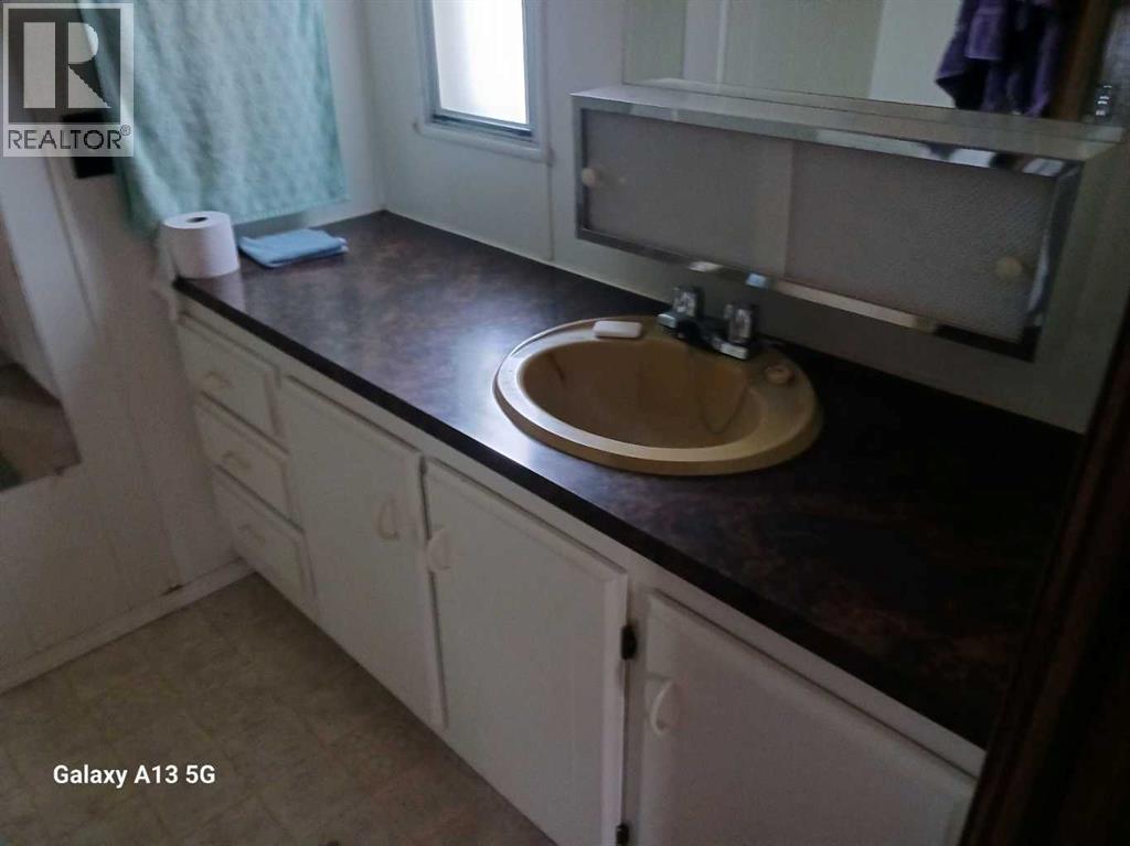 26 Westwood Court, Innisfail, Alberta  T4G 1S2 - Photo 31 - A2279493