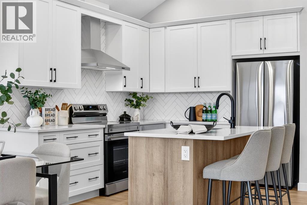 2242 Bayview Drive Sw, Airdrie, Alberta  T4B 5N4 - Photo 6 - A2279707