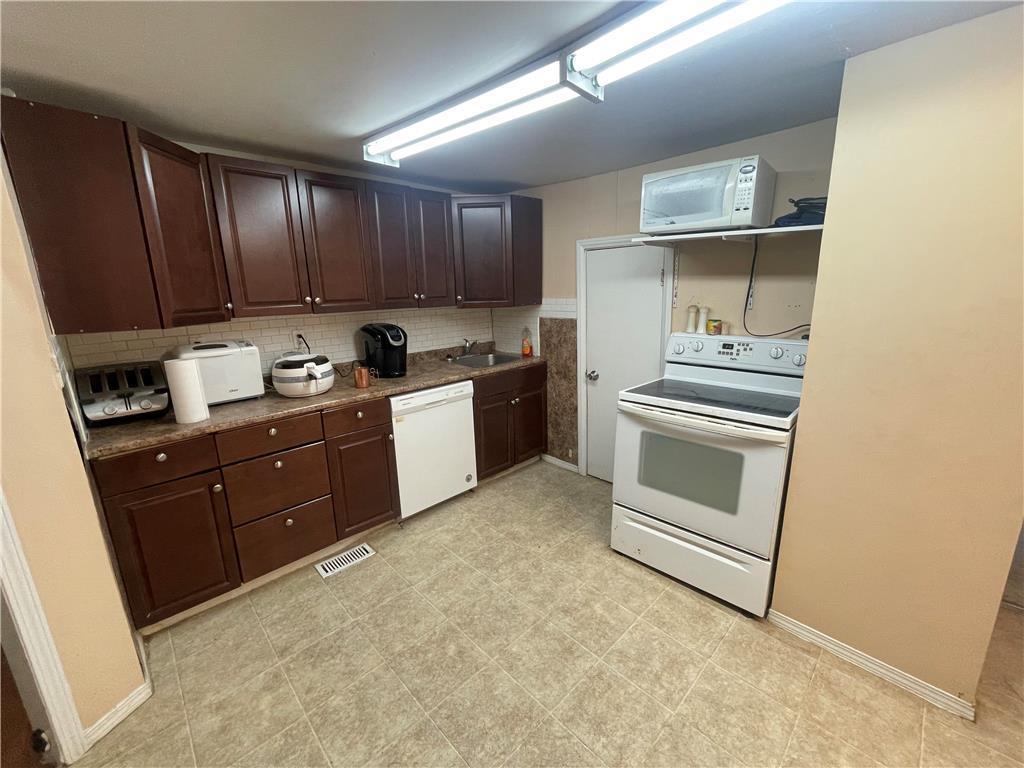 27 Inkster Boulevard, Winnipeg, Manitoba  R2R 1Z7 - Photo 1 - 202601952