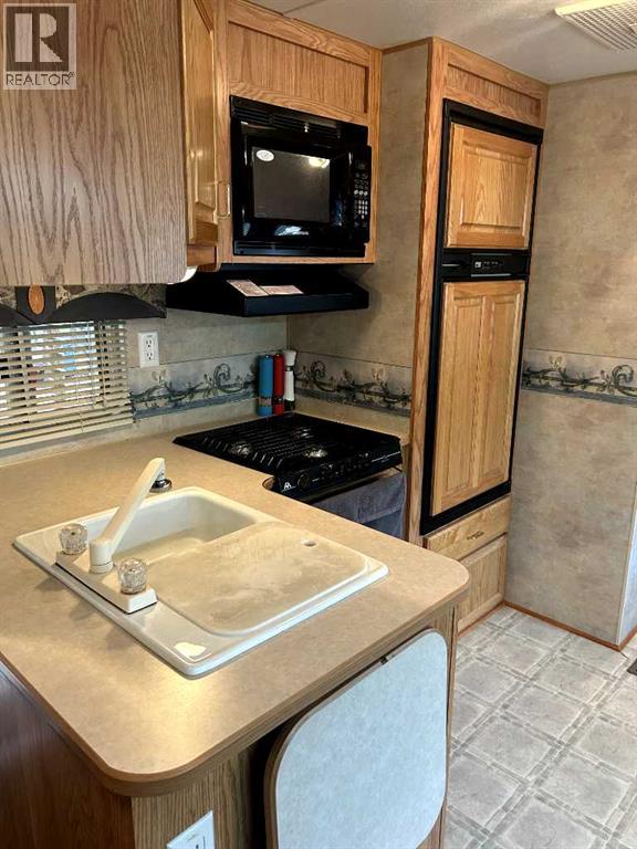 111 & 112, 200 4 Avenue Sw, Sundre, Alberta  T0M 1X0 - Photo 11 - A2236098