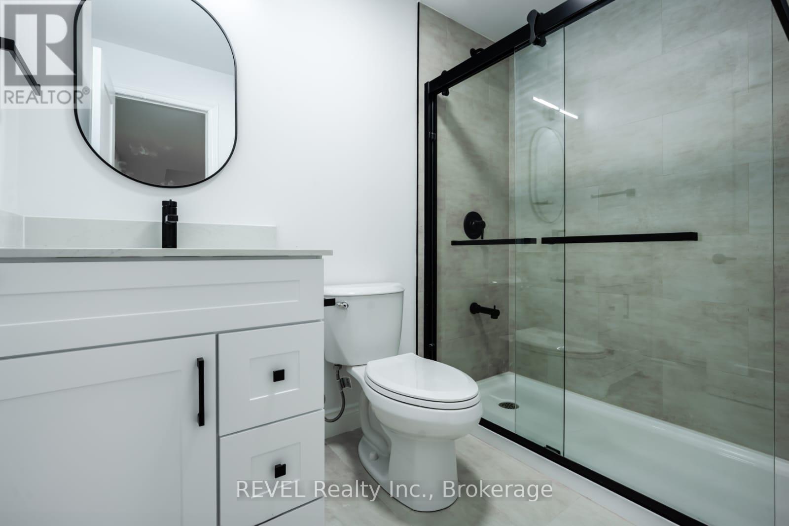 #lower - 21 Willson Drive, Thorold (Hurricane/merrittville), Ontario  L2V 0M3 - Photo 4 - X12750976