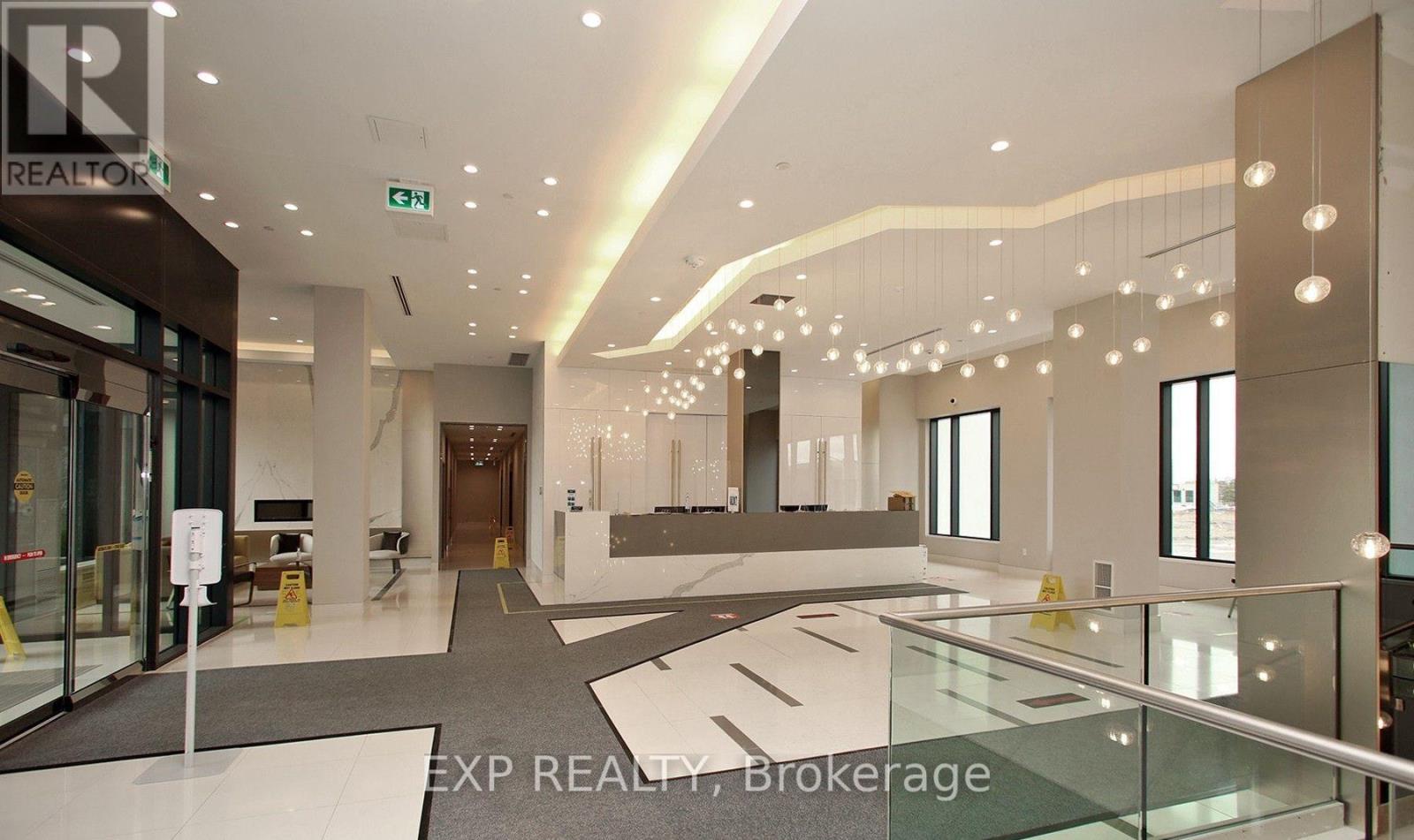 408 - 65 Watergarden Drive, Mississauga, Ontario  L5R 0G9 - Photo 2 - W12750922