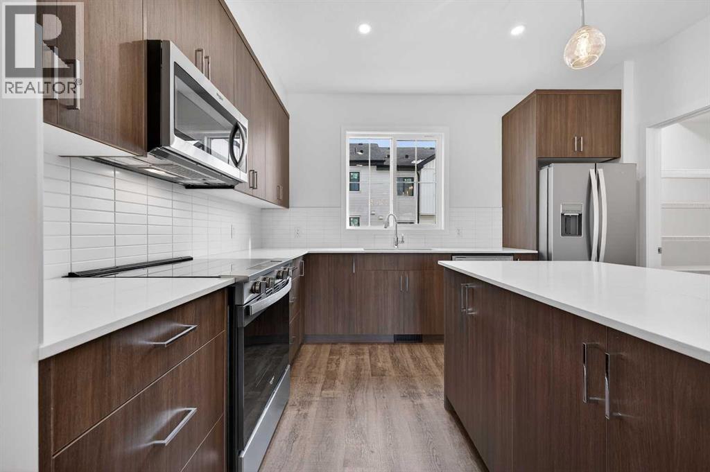 64 Creekside Drive Sw, Calgary, Alberta  T2X 6E2 - Photo 11 - A2282898