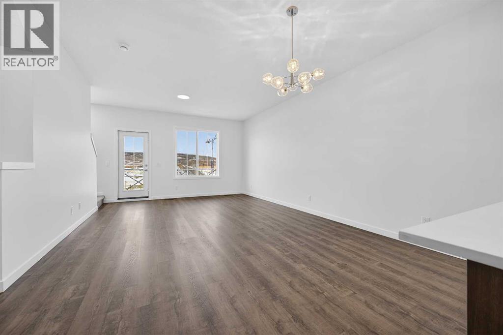 64 Creekside Drive Sw, Calgary, Alberta  T2X 6E2 - Photo 4 - A2282898