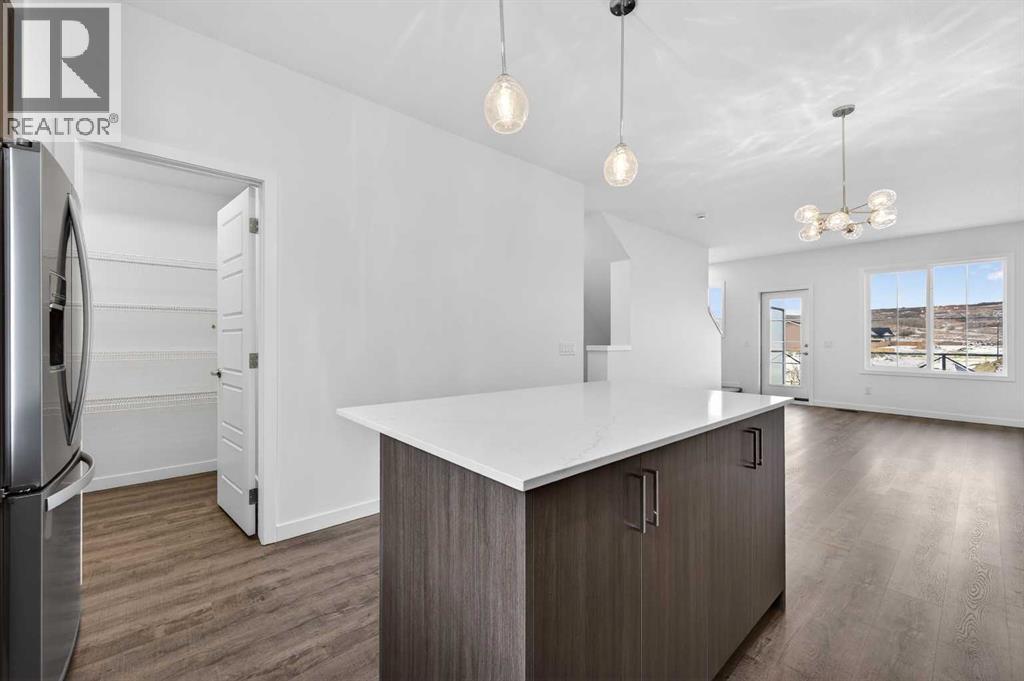 64 Creekside Drive Sw, Calgary, Alberta  T2X 6E2 - Photo 13 - A2282898