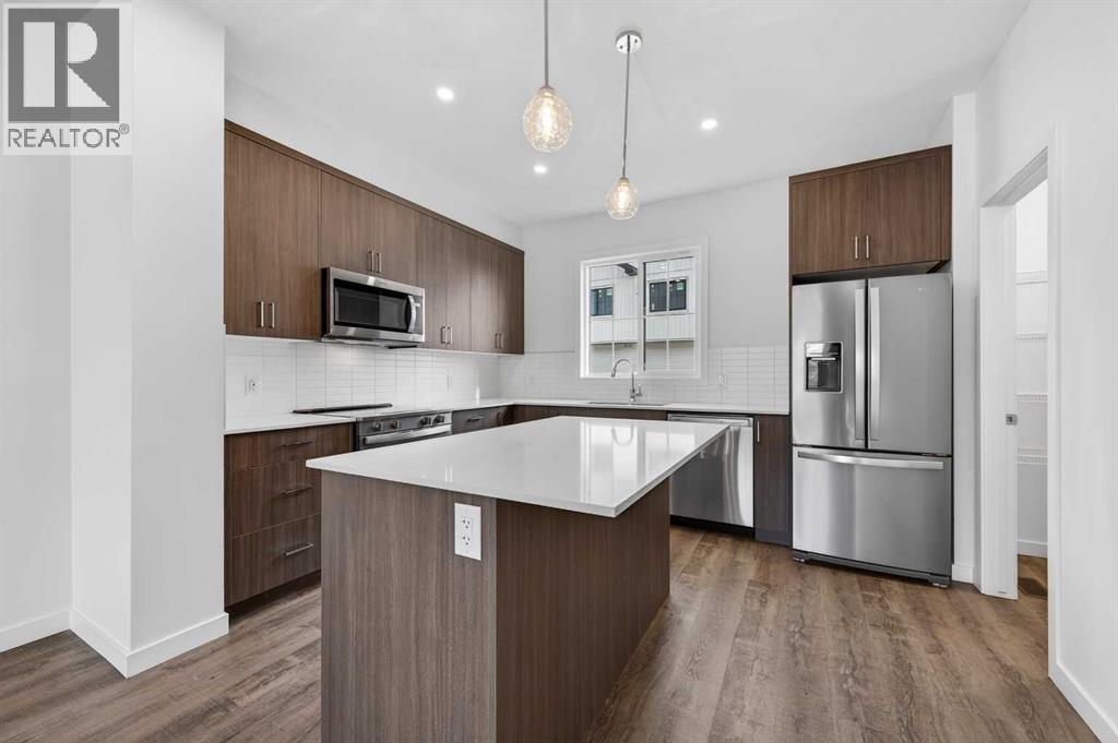 64 Creekside Drive Sw, Calgary, Alberta  T2X 6E2 - Photo 3 - A2282898