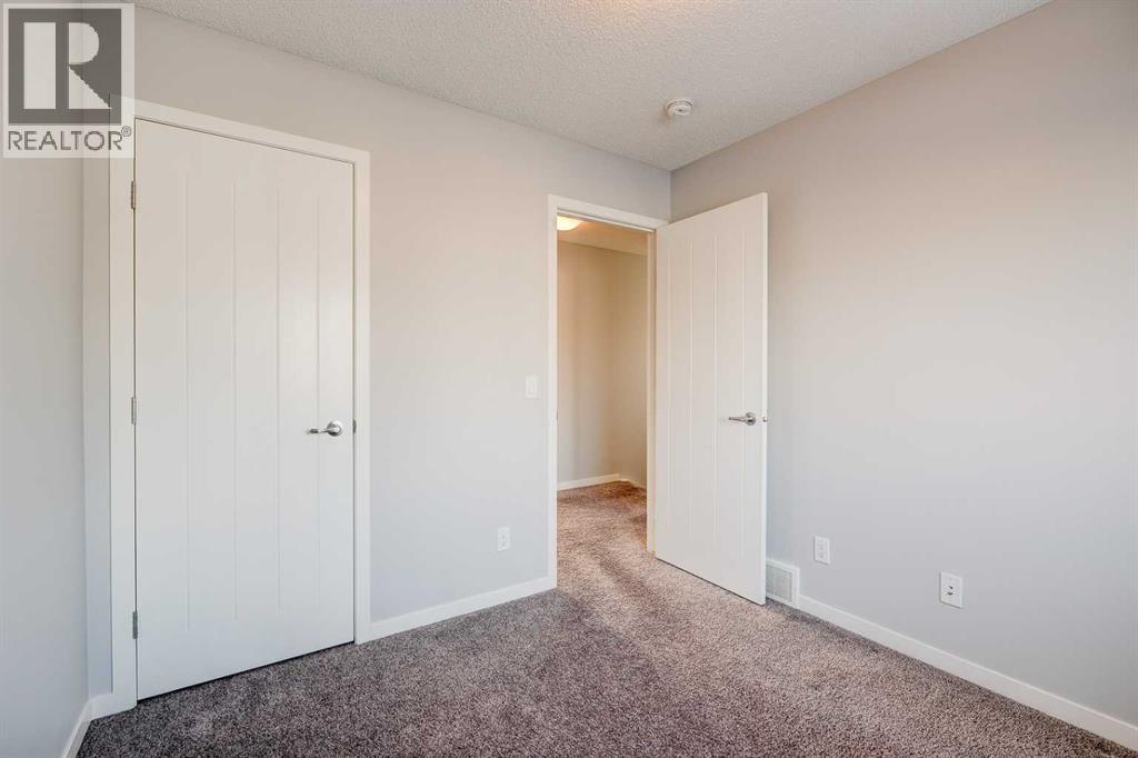 8036 Masters Boulevard, Calgary, Alberta  T3M 2B9 - Photo 31 - A2277573