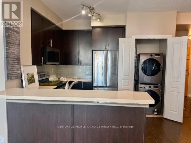 1409 - 3939 Duke Of York Boulevard, Mississauga, Ontario  L5B 4N2 - Photo 2 - W12751654