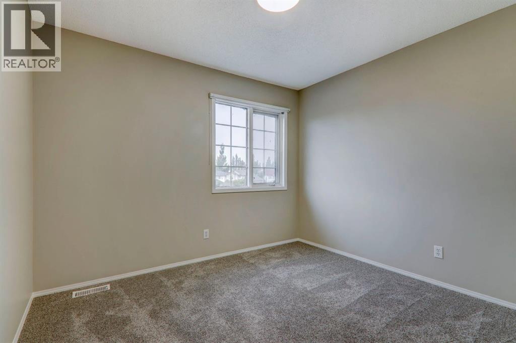 435 Douglas Ridge Mews Se, Calgary, Alberta  T2Z 2M4 - Photo 26 - A2262784