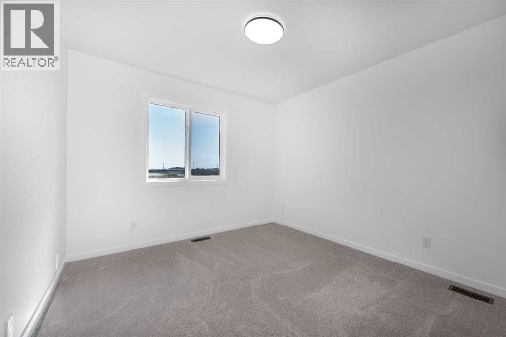 137 Clearwater Terrace, Chestermere, Alberta  T1X 3A7 - Photo 29 - A2271578