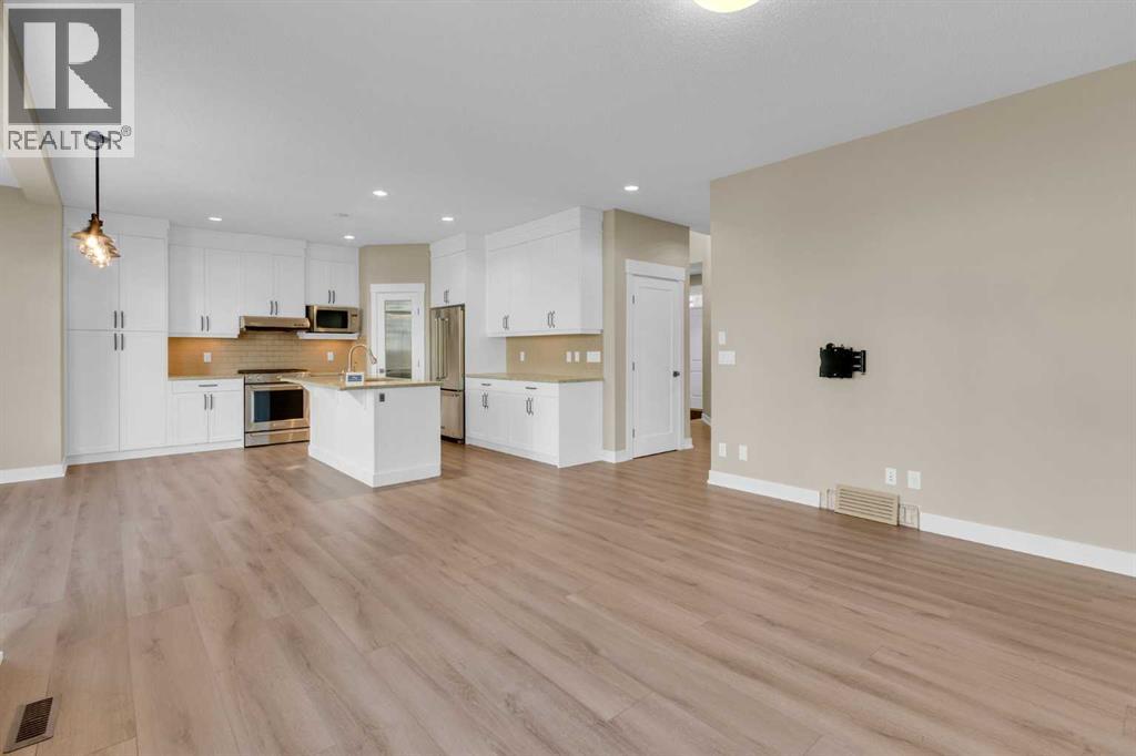 179 Panatella Cape Nw, Calgary, Alberta  T3K 0W3 - Photo 6 - A2279943