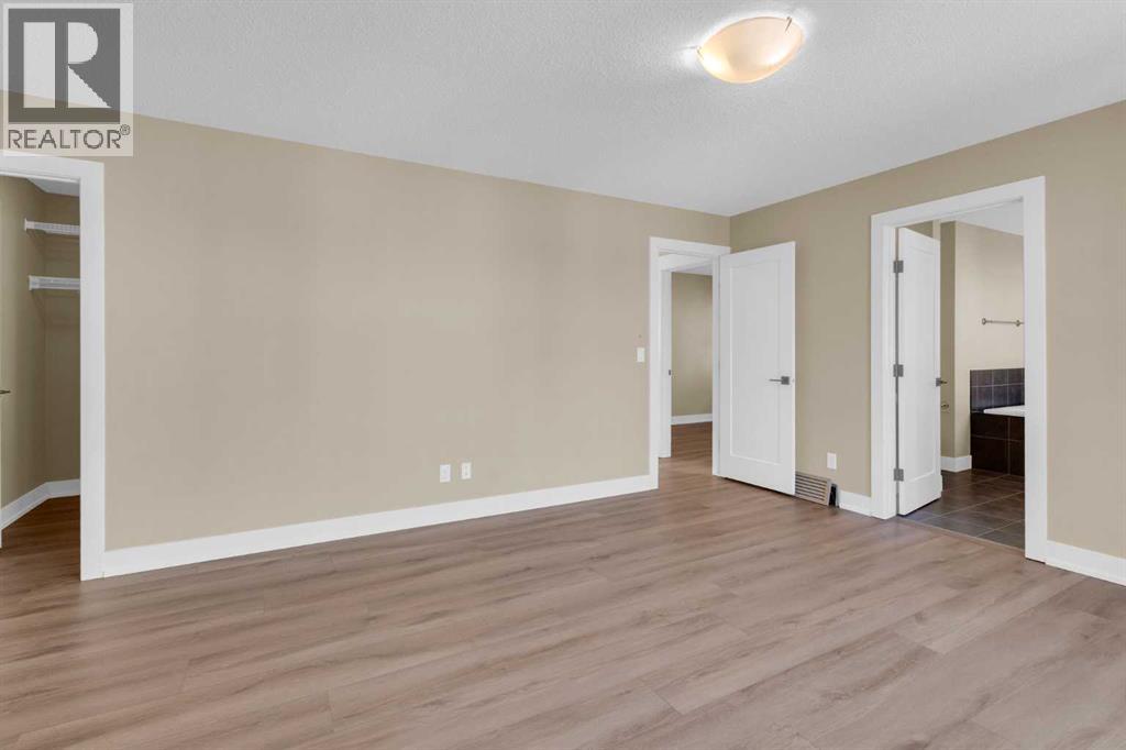 179 Panatella Cape Nw, Calgary, Alberta  T3K 0W3 - Photo 25 - A2279943