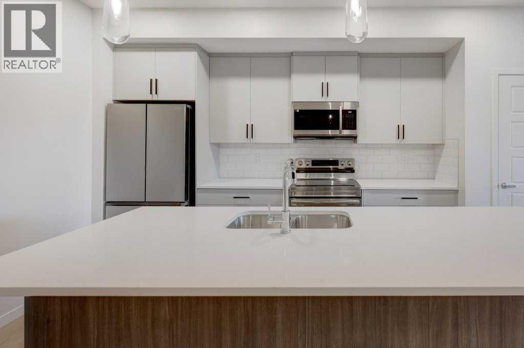 409, 245 Edith Place Nw, Calgary, Alberta  T3R 2C9 - Photo 7 - A2275300