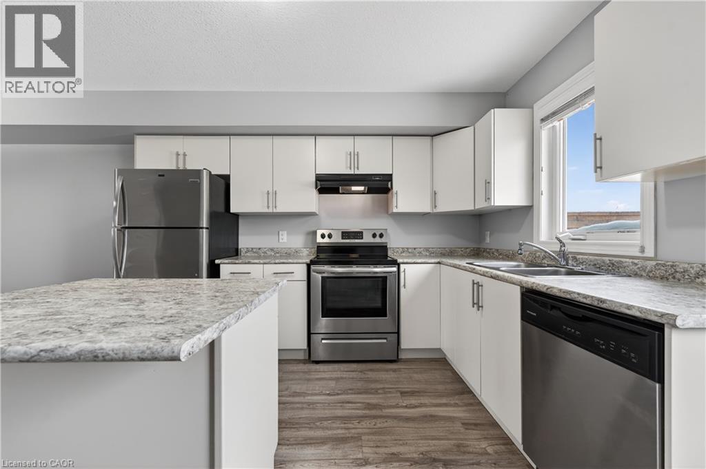 7768 Ascot Circle Unit# 15, Niagara Falls, Ontario  L2H 3P9 - Photo 6 - 40801679